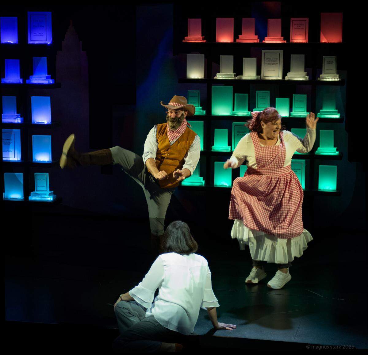Delia (Dalia Aleman) remembers watching the movie “Seven Brides for Seven Brothers” as characters from the movie (Margot Moreland and Ben Sandomir) come to life in “Left on Tenth,” now at GableStage in Coral Gables through Dec. 21.