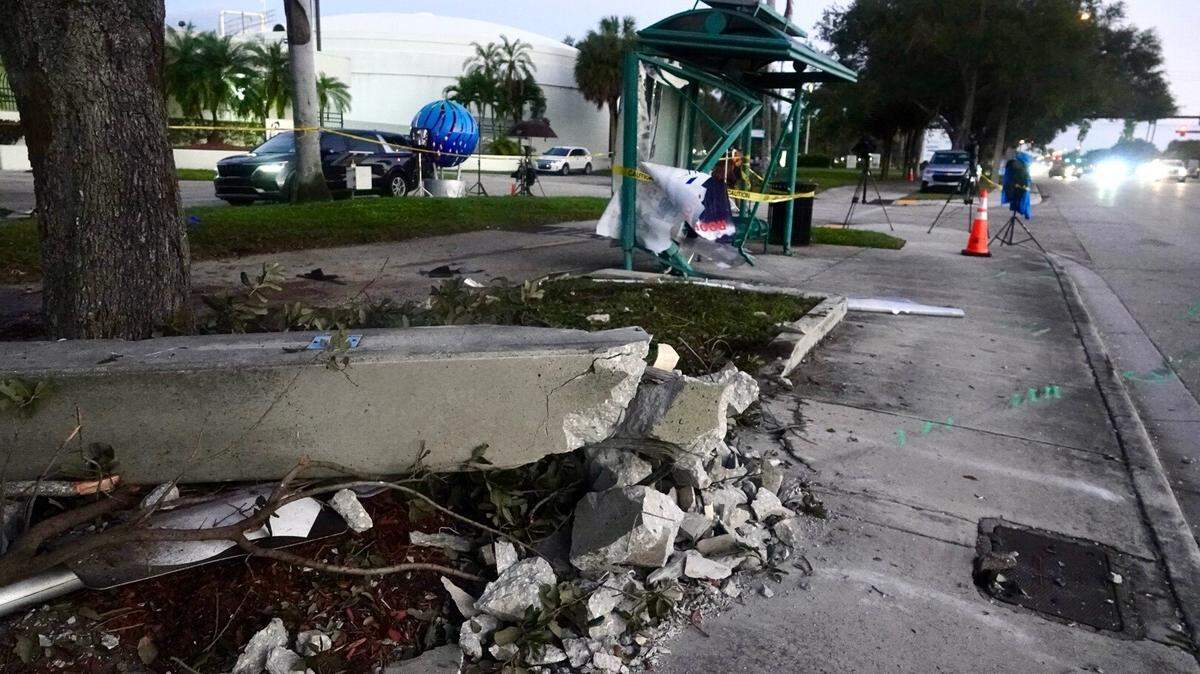 The site of a fatal car crash on the 1600 block of North Federal Highway in Pompano Beach, Tuesday, Dec. 30, 2025. Three teenagers, ages 15, 16, and 18, died after their car collided with another vehicle and struck a concrete light pole and bus stop on Monday evening. (Joe Cavaretta/South Florida Sun Sentinel)