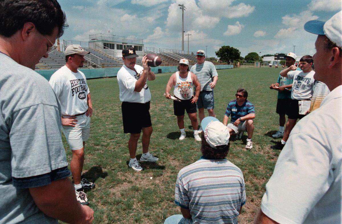 In this July 18, 1998, file photo, Byron Walker holds a demonstration during an AYFL coaches clinic at PAL Field in Plantation.