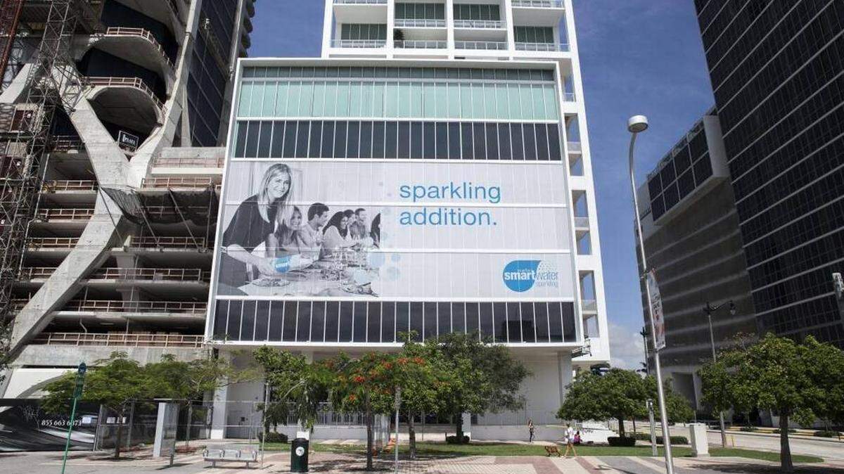 A billboard on Ten Museum Park on Biscayne Boulevard photographed on Saturday, June 17, 2017. Miami Beach is considering selling outdoor ads on its parking garages.