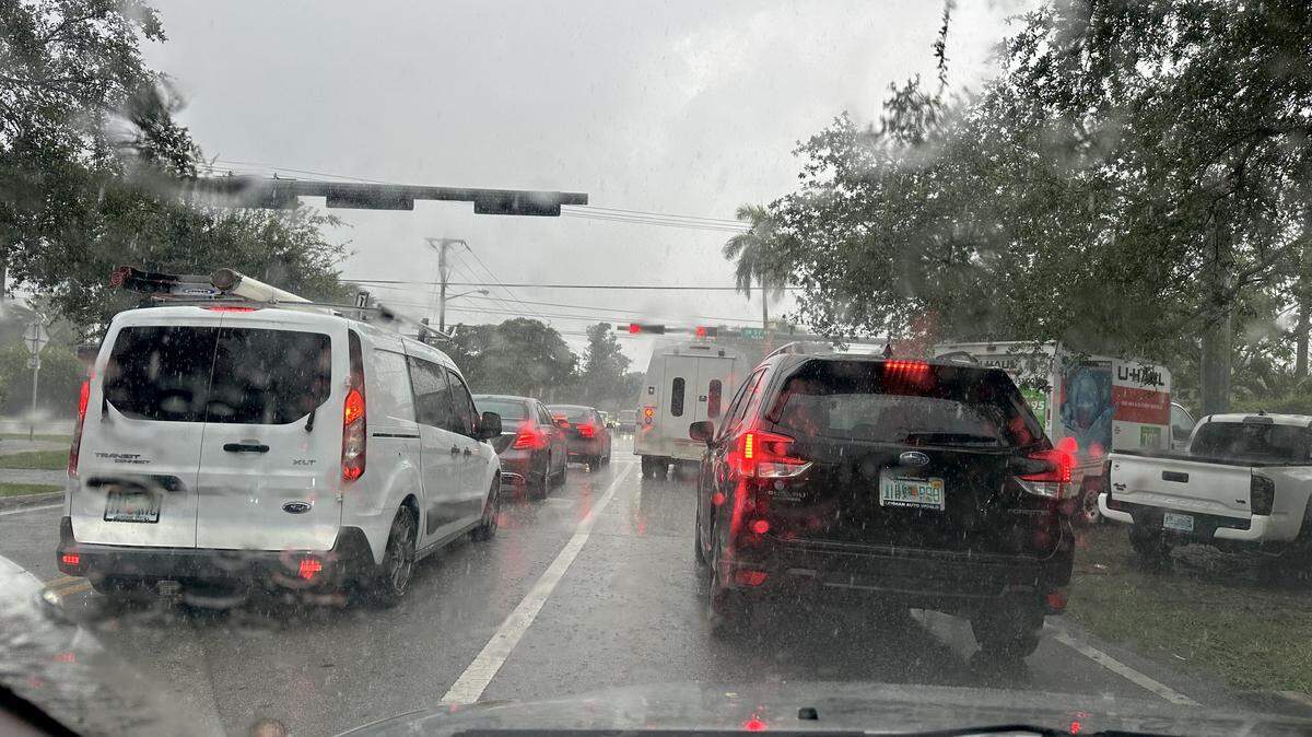 Red tail lights, bumper to bumper and steady rains reducing vision and puddling roads, like this stretch of Miller Road in the Coral Gables area on Friday, Sept. 5, 2025, were familiar sites on a day that foretells the coming weather week.