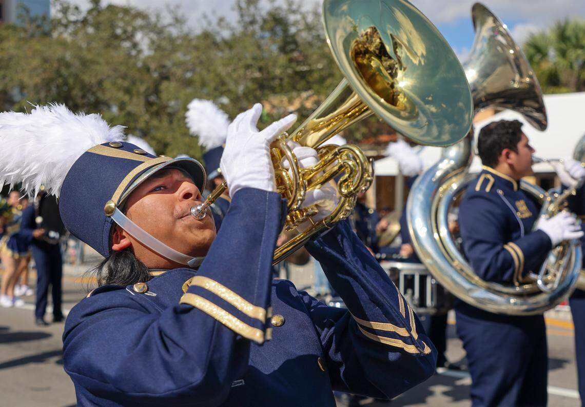 Miami High marching band performs at the Miami's 50th Annual Three Kings Parade, also known as the "Desfile de los Reyes," a vibrant celebration that takes place honoring the Feast of the Epiphany.