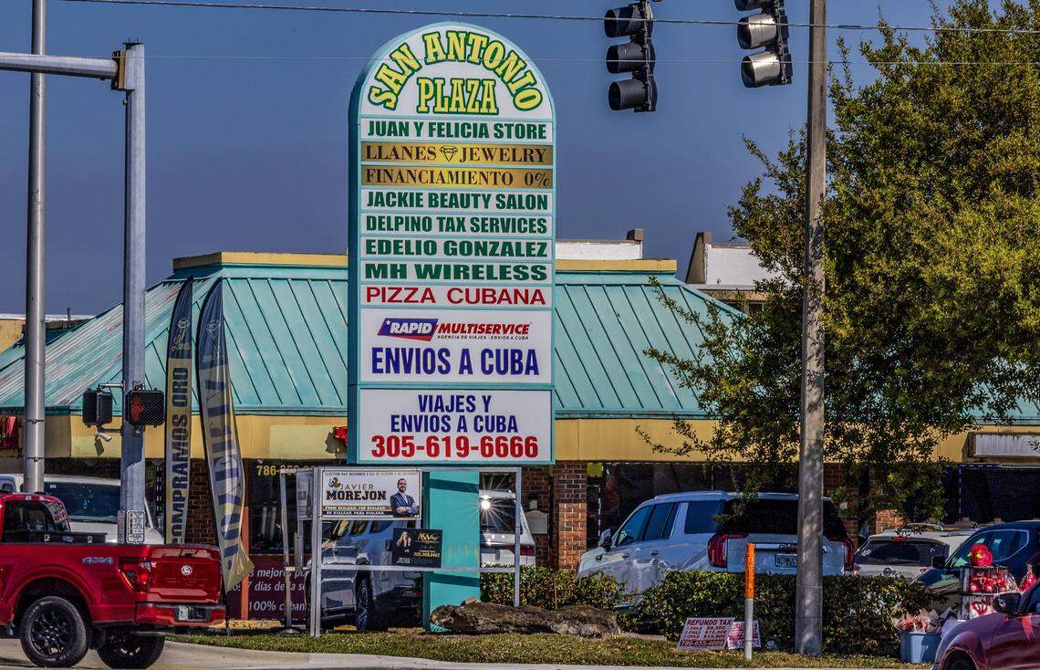A sign advertises the services of RapidMultiservice, a Hialeah company that ships goods to Cuba.