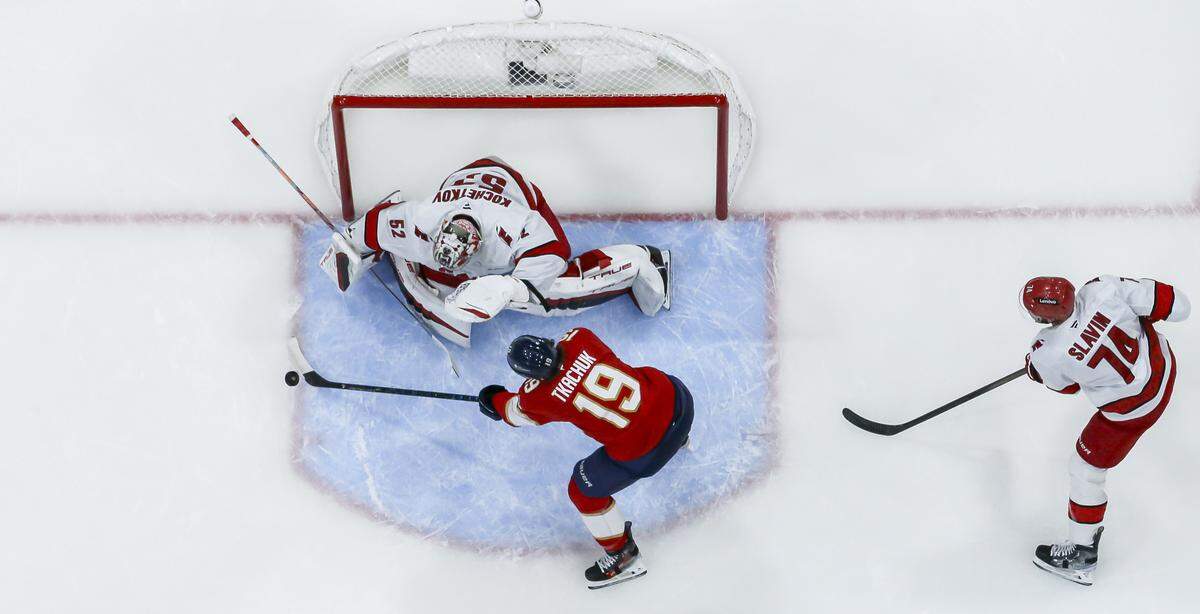 Florida Panthers left wing Matthew Tkachuk (19) tries to score against Carolina Hurricanes goaltender Pyotr Kochetkov (52) in the third period of Game 3 during the Eastern Conference final of the NHL Stanley Cup playoffs at Amerant Bank Arena on Saturday, May 24, 2025, in Sunrise, Fla.