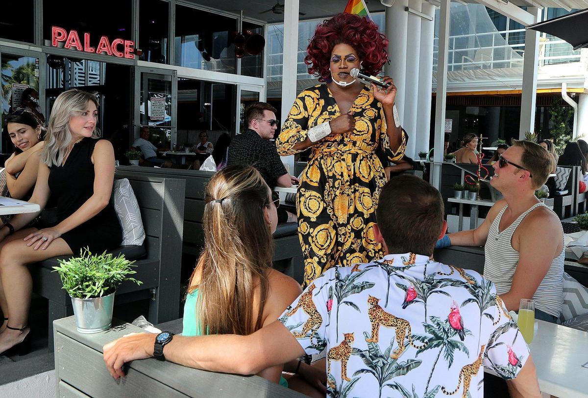 Drag artist Tiffany T. Fantasia performs at the iconic Palace Bar & Restaurant on Ocean Drive, which is famous for its drag brunch.