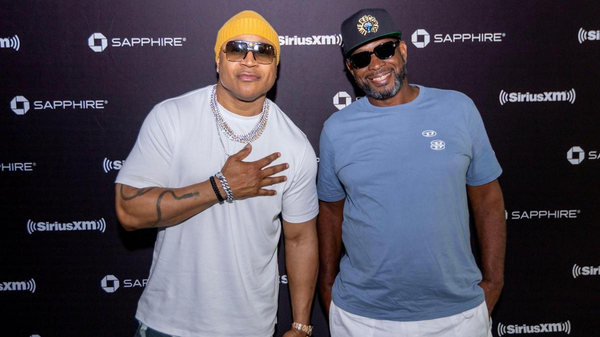 American rapper Uncle Luke strikes a pose nex to American rapper LL Cool J at th SiriusXM Studios in Miami Beach, Florida, before guest starring on LL Cool J’s Rock the Bells Radio Show, on Friday, May 5, 2023.