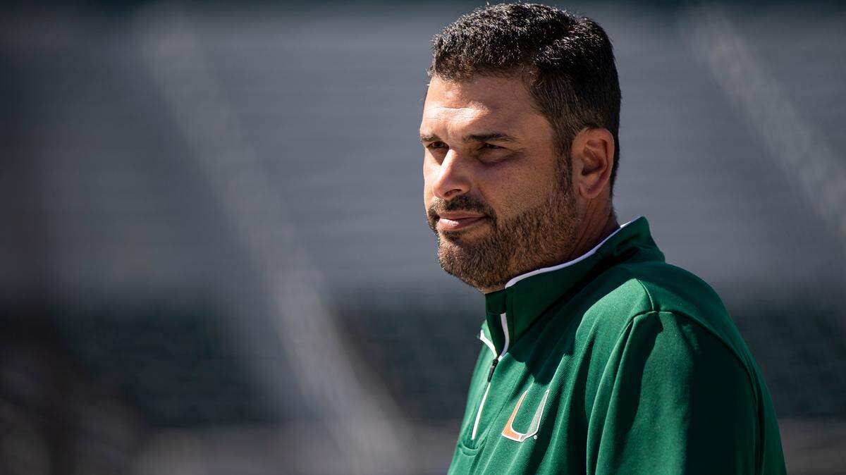 J.D. Arteaga, the pitching coach for the Miami Hurricanes baseball team, speaks to reporters during media day at Mark Light Field on Tuesday, Feb. 14, 2023, in Coral Gables, Fla.