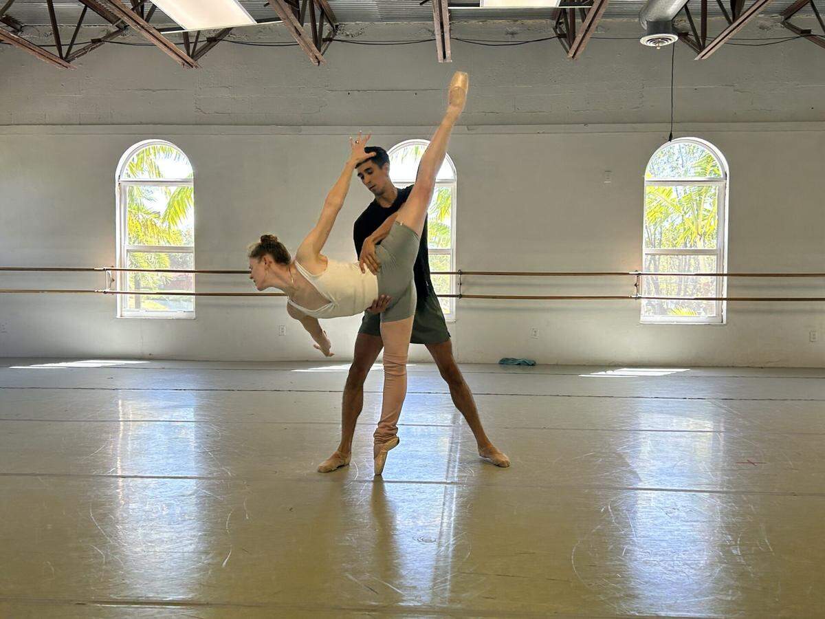 Dimensions Dance Theatre’s Chloe Freytag and Eric Paz rehearse “Valley of Shadows,” choreography by Selah Jane Oliver.