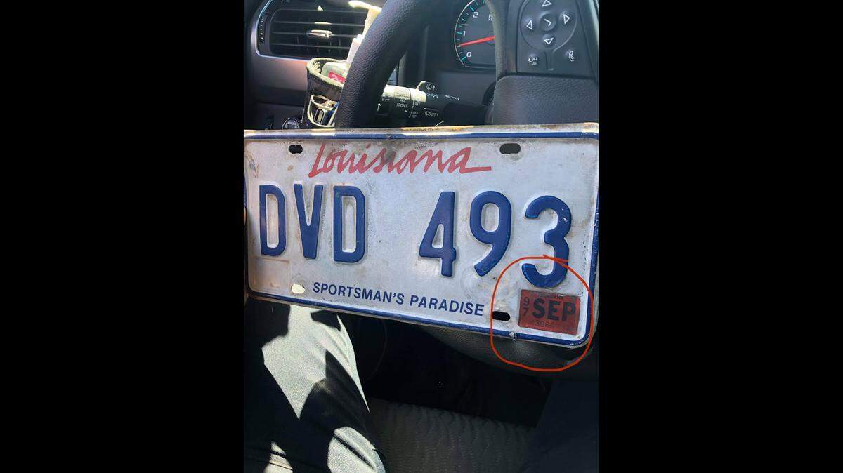 Police in Louisiana pulled over a driver with tags that expired in 1997, they say.