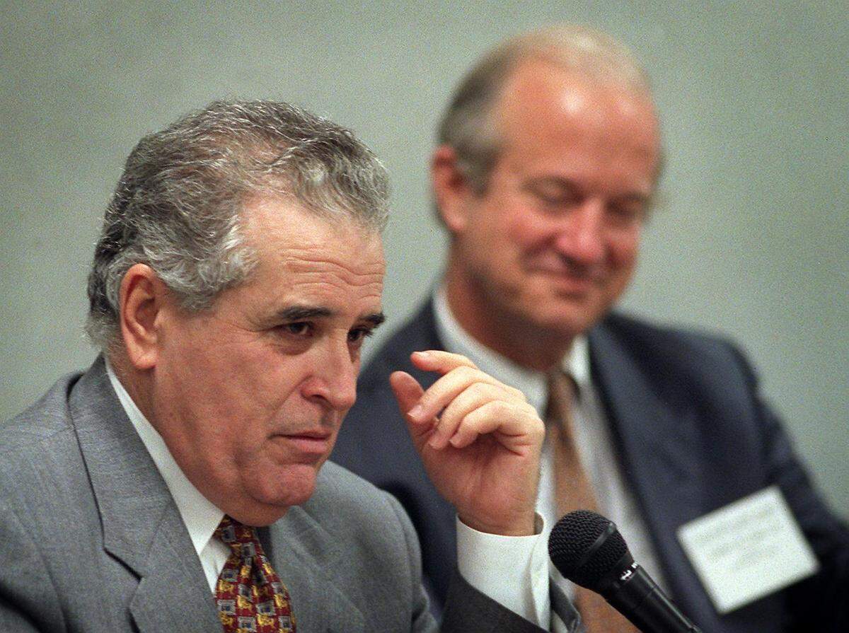 In this file photo from Feb. 12, 1997, Cuban human rights activist Elizardo Sanchez speaks during a forum on human rights in Cuba at the University of Miami with International Studies professor Ambler Moss.