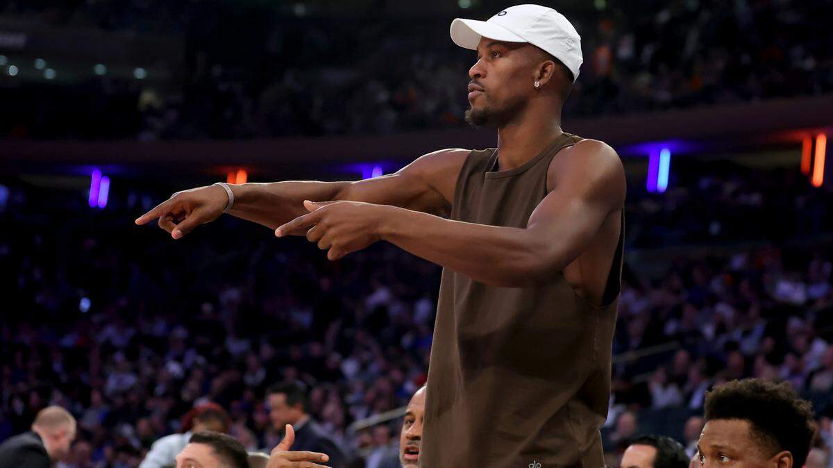 Miami Heat injured forward Jimmy Butler (22) talks to his teammates from the bench during the third quarter of game two of the 2023 NBA Eastern Conference semifinal playoffs against the New York Knicks at Madison Square Garden.