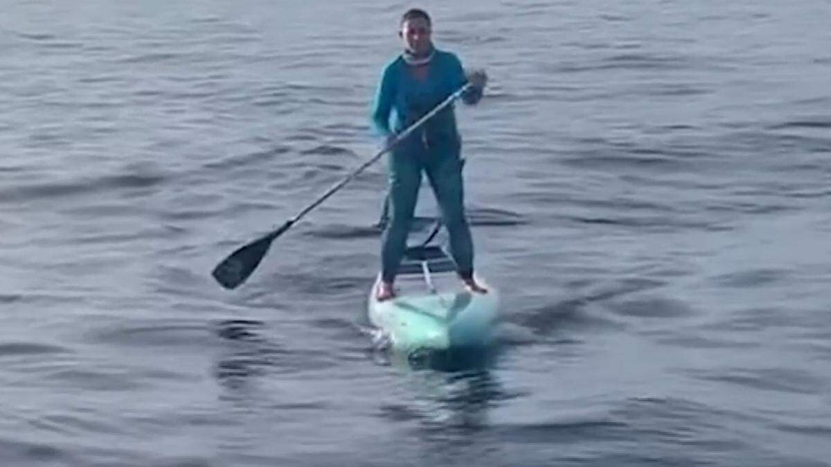 A paddleboarder halfway between the Bahamas and Florida for a charity event encountered a hammerhead shark in the water