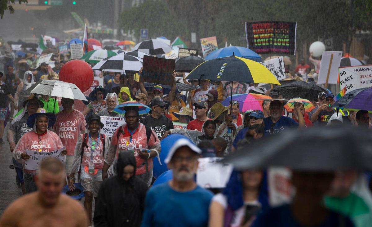 People march through the streets of downtown Fort Lauderale during an Anti-Hate March led by We the People on Sunday, July 2, 2023, in downtown Fort Lauderdale.