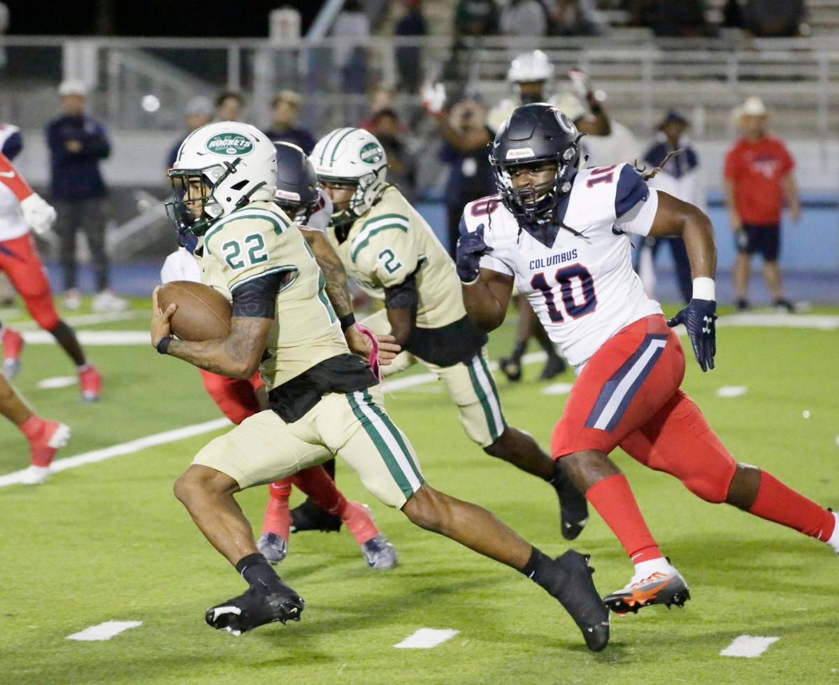 Miami Central Rockets running back Jonathan Harris (22) gains yardage against Columbus Explorers during football game on Friday, October 21, 2022 at Traz Powell Stadium in Miami. Andrew Uloza / for Miami Herald