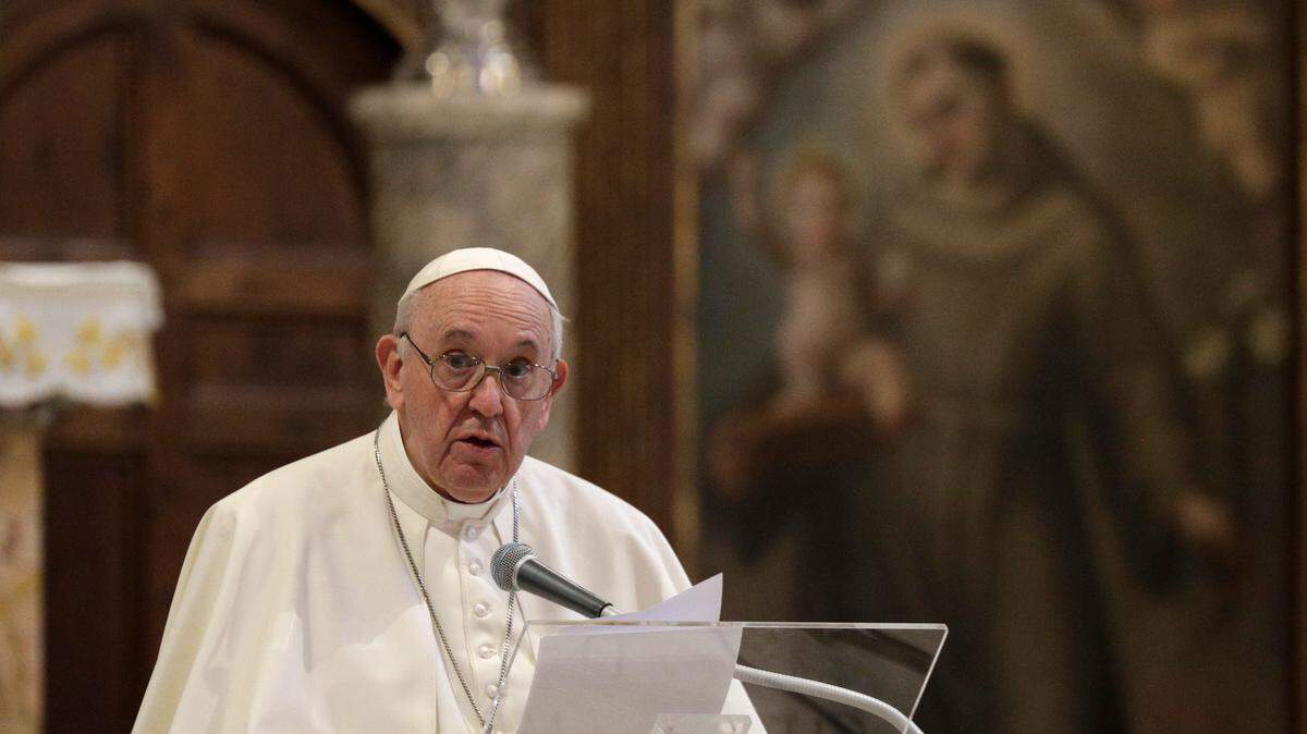 Pope Francis attends a inter-religious ceremony for peace in the Basilica of Santa Maria in Aracoeli, in Rome Tuesday, Oct. 20, 2020.