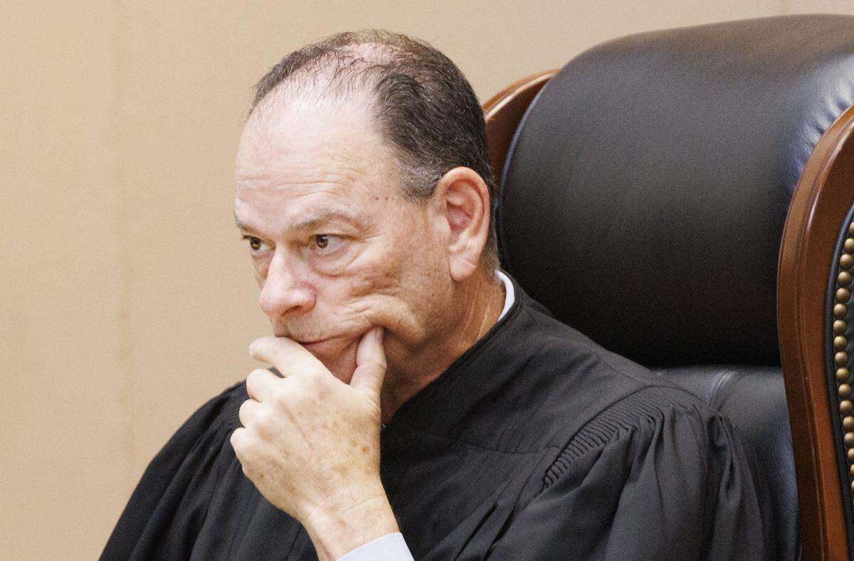Judge Kevin Emas listens during a hearing at the Third District Court of Appeal for a case Emilio González brought against the City of Miami on Tuesday, July 29, 2025, in Miami.