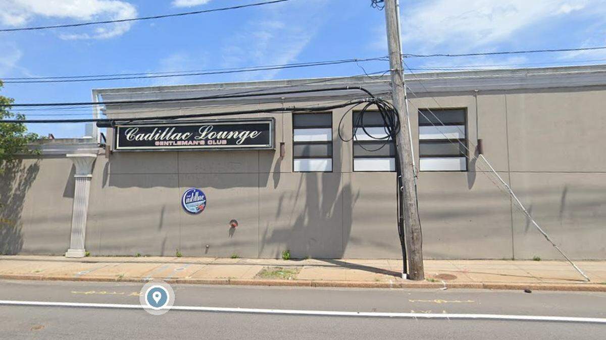 An accused robber stole $22,000 in $1 bills from a Providence strip club, the owner of the Rhode Island club says.