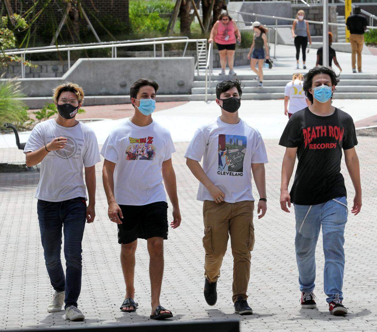 Students arrive at the Student Union at the University of Central Florida, in Orlando, Monday, August 24, 2020, on the first day of classes with new safety protocols in place to fight the coronavirus pandemic. (Joe Burbank/Orlando Sentinel/TNS)