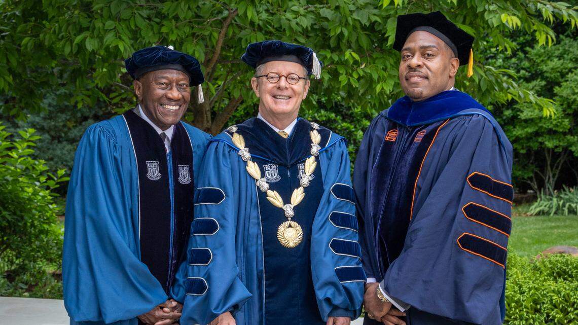 David Robinson II, left, stands next to Vincent Price, president of Duke University, and H. Timothy Lovelace Jr., John Hope Franklin Research Scholar, Professor of Law and History. Robinson, who was born and raised in Miami’s Overtown, received an honorary Doctor of Laws degree at Duke’s May 11 commencement. He was one of three Black students to integrate Duke in 1961.