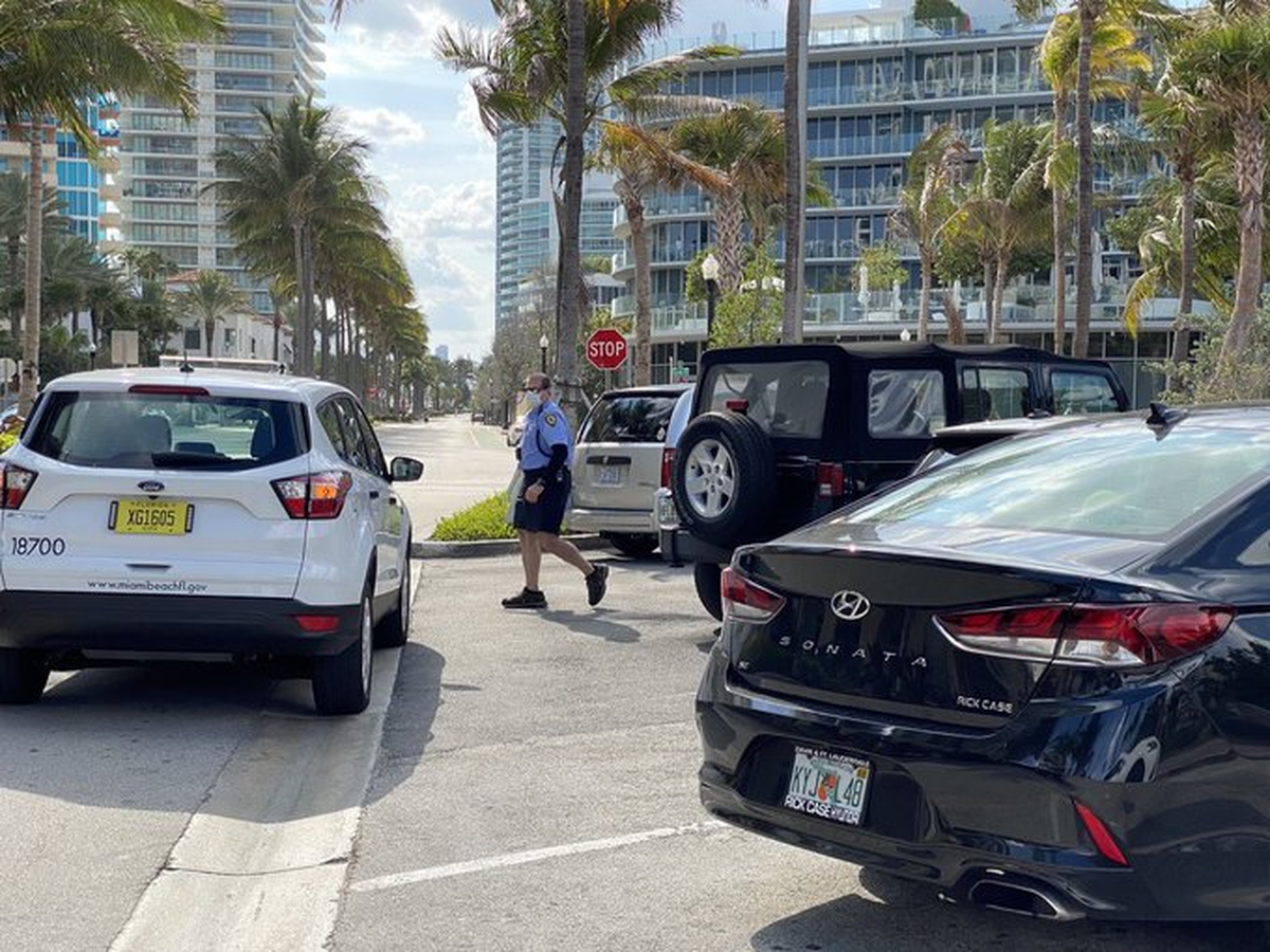 A parking enforcement officer patrols in Miami Beach.