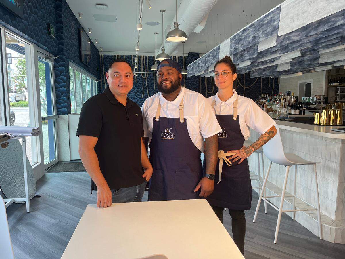 Owner Cesar Cifuentes, Chef Raheem Sealey and Chef Monika Dominguez at the new J&C Oyster in Hollywood.
