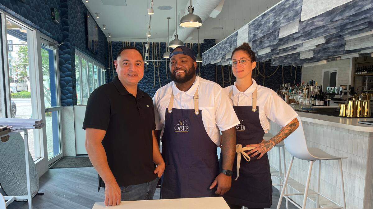 Owner Cesar Cifuentes, Chef Raheem Sealey and Chef Monika Dominguez at the new J&C Oyster in Hollywood.