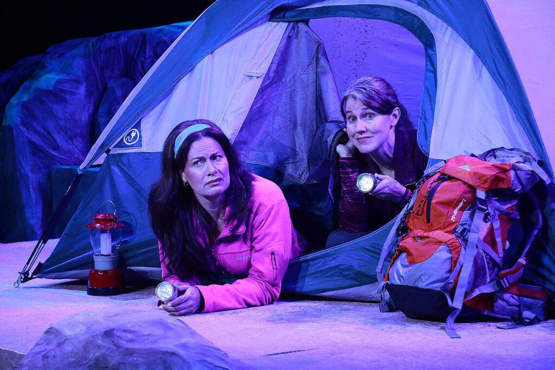 Anna Lise Jensen as Monica and Elizabeth Price as Sophie check out things that go bump in the night on a remote mountain in “Step By Step” at Actors’ Playhouse, Coral Gables.