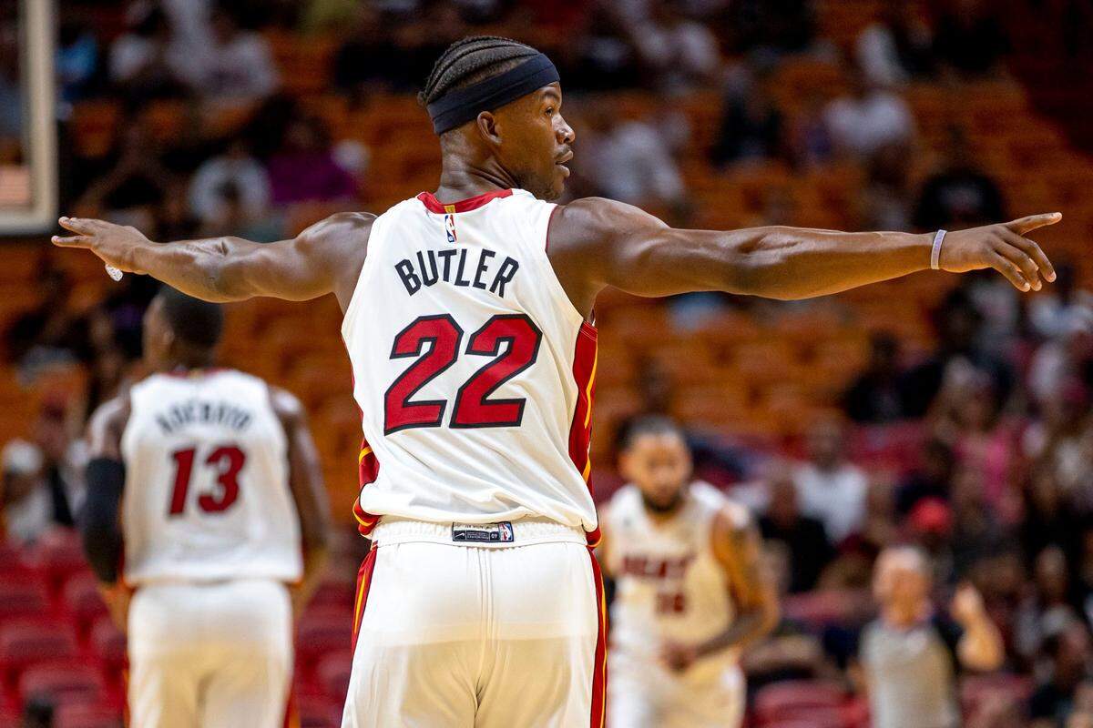 Miami Heat forward Jimmy Butler (22) directs teammates during the first quarter of an NBA preseason game against the New Orleans Pelicans at FTX Arena in Miami on October 12, 2022.