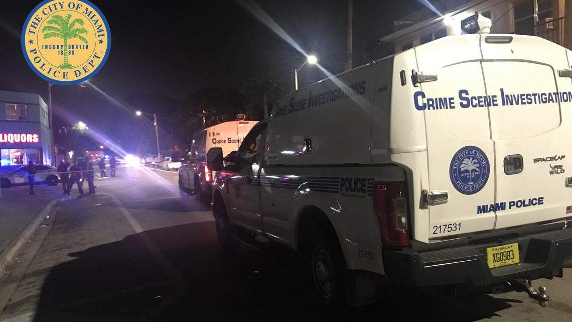 Miami police on the scene of a Saturday night shooting in Overtown that sent five people to Jackson Memorial Hospital.