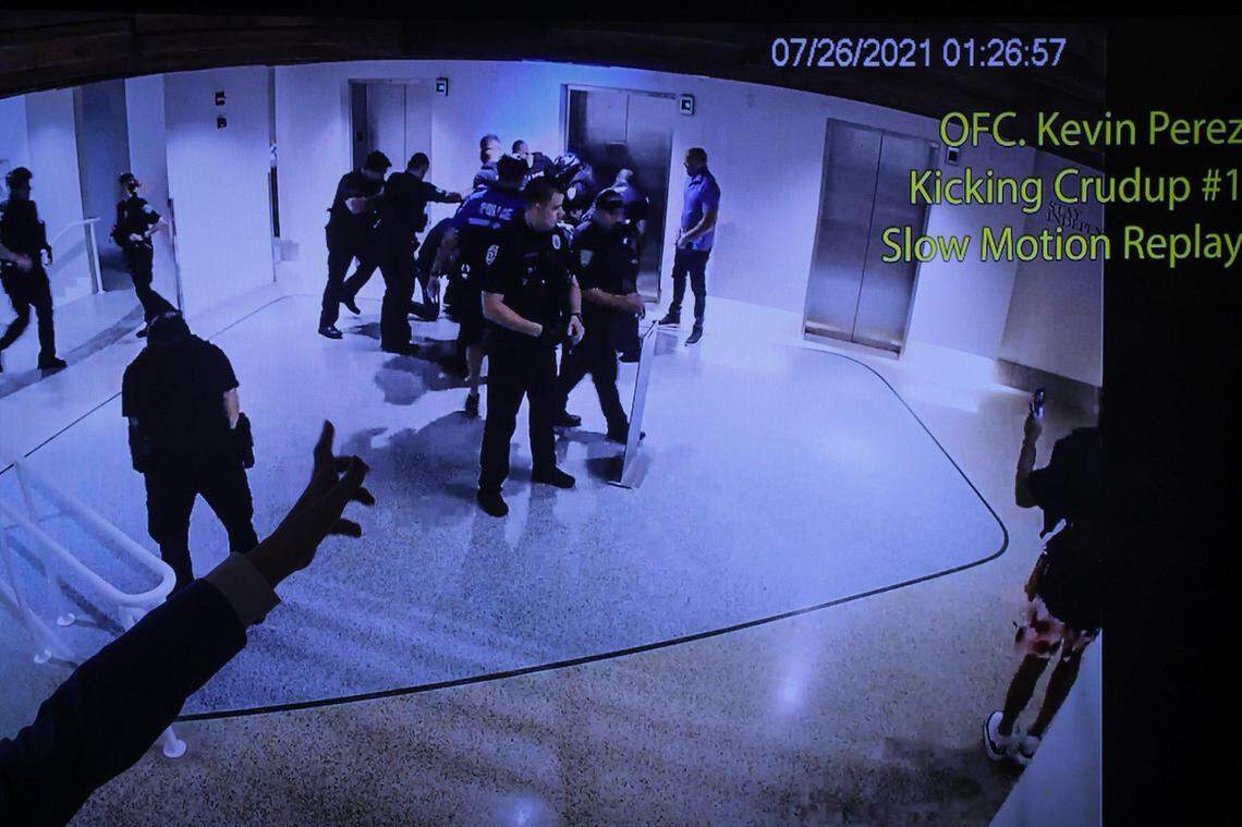 State Attorney Katherine Fernandez Rundle points to the video where a police officer allegedly kicks a defendant after announcing the arrest of Miami Beach police officers at the Miami-Dade State Attorney’s Office on Monday, August 2, 2021.