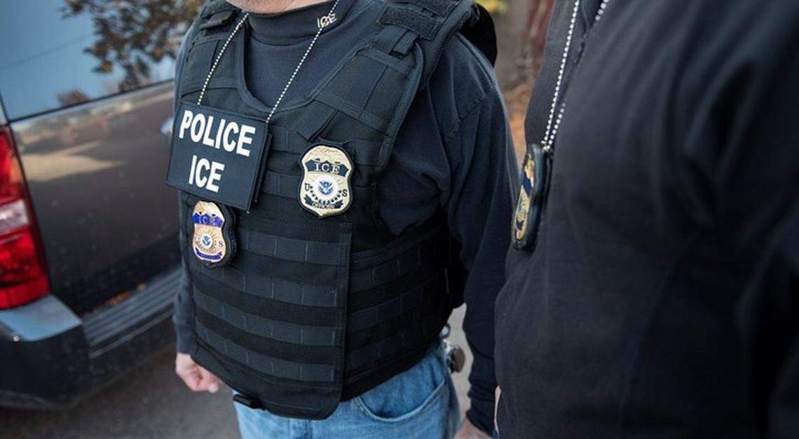 An ICE officer.