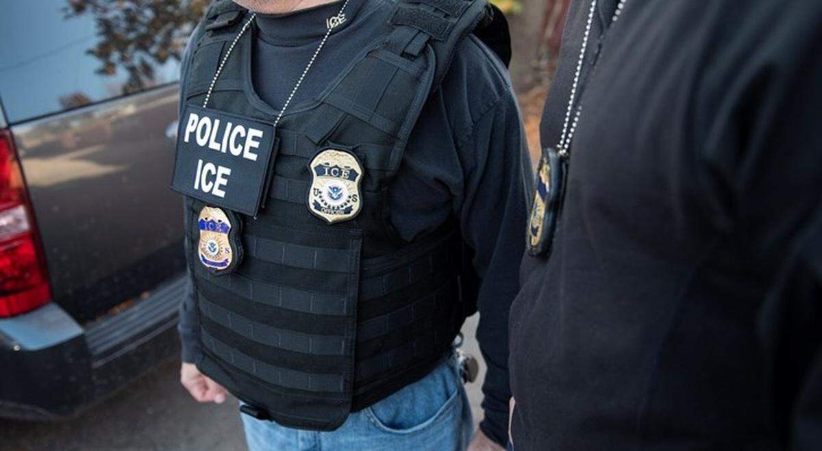 An ICE officer.