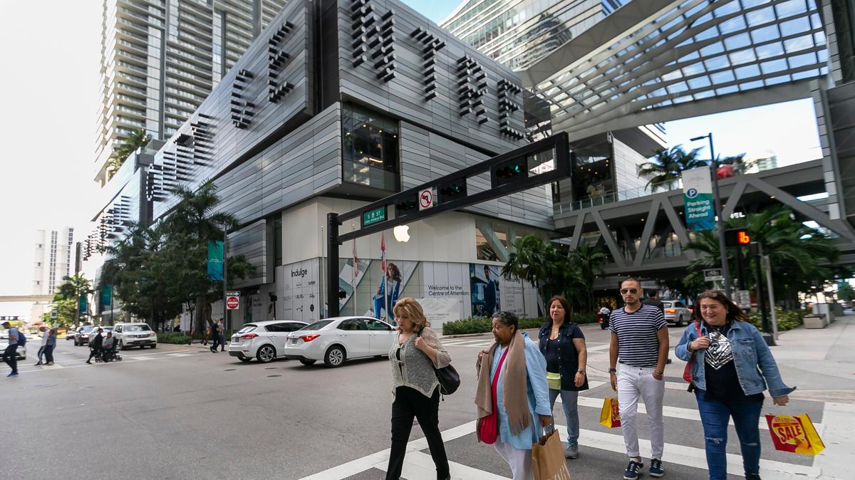 Pedestrians walk outside Brickell City Centre in Miami in 2020. The urban mall has six more shops and restaurants coming this year.