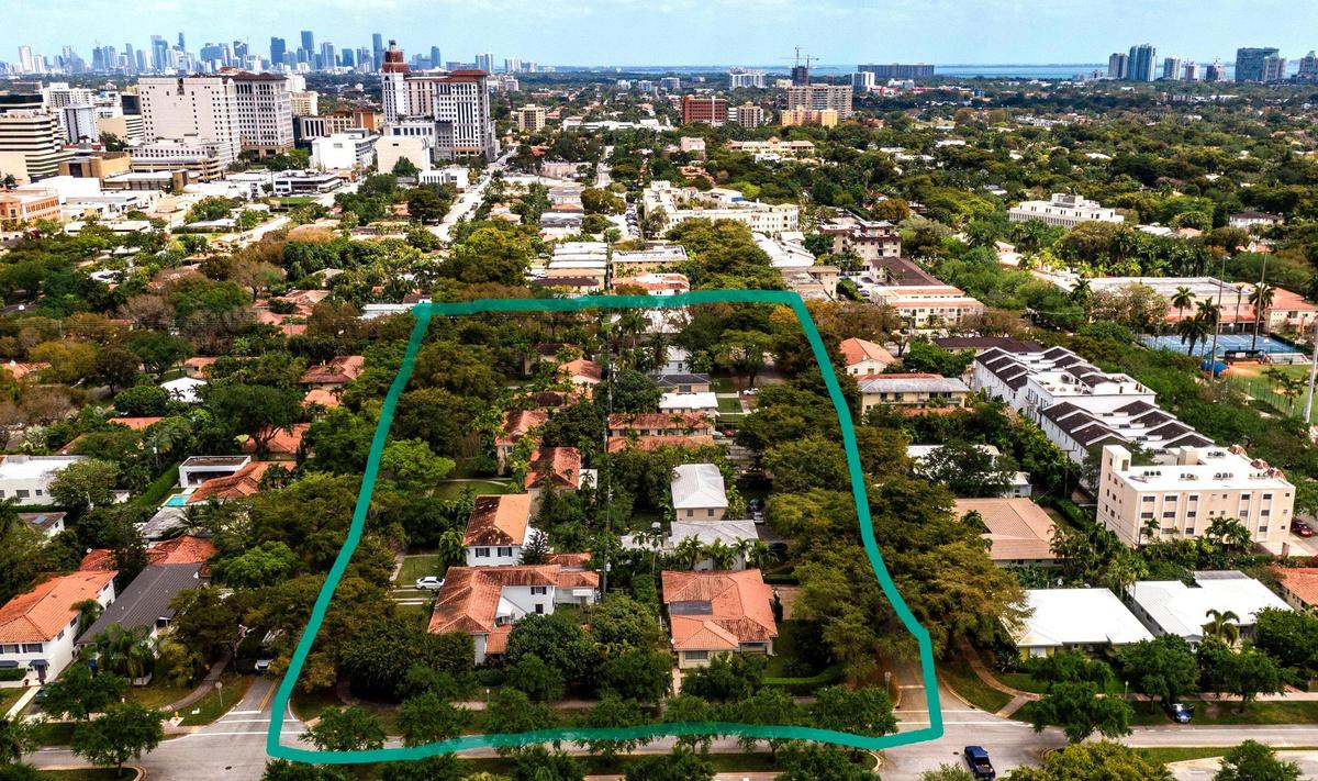 A drone view of a Coral Gables block once made up of 13 affordable, older small apartment buildings that are getting torn down to make way for a luxury residential development called The Village of Coral Gables. The block is bounded by Malaga Avenue and Santander Avenue to the north and south, and Segovia Street and Hernando Street on the west and east.