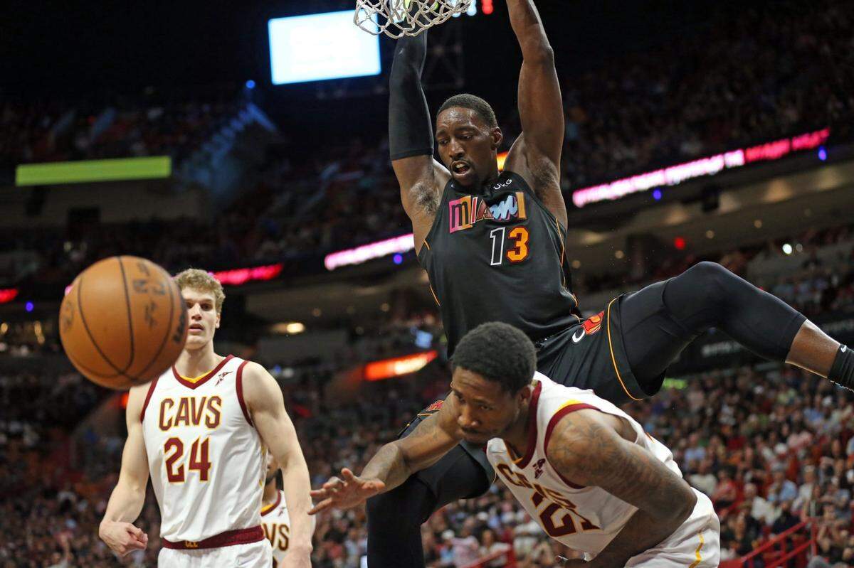 Miami Heat center Bam Adebayo (13) dunks the ball against the Cleveland Cavaliers at the FTX Arena in Miami on Friday, March 11, 2022.