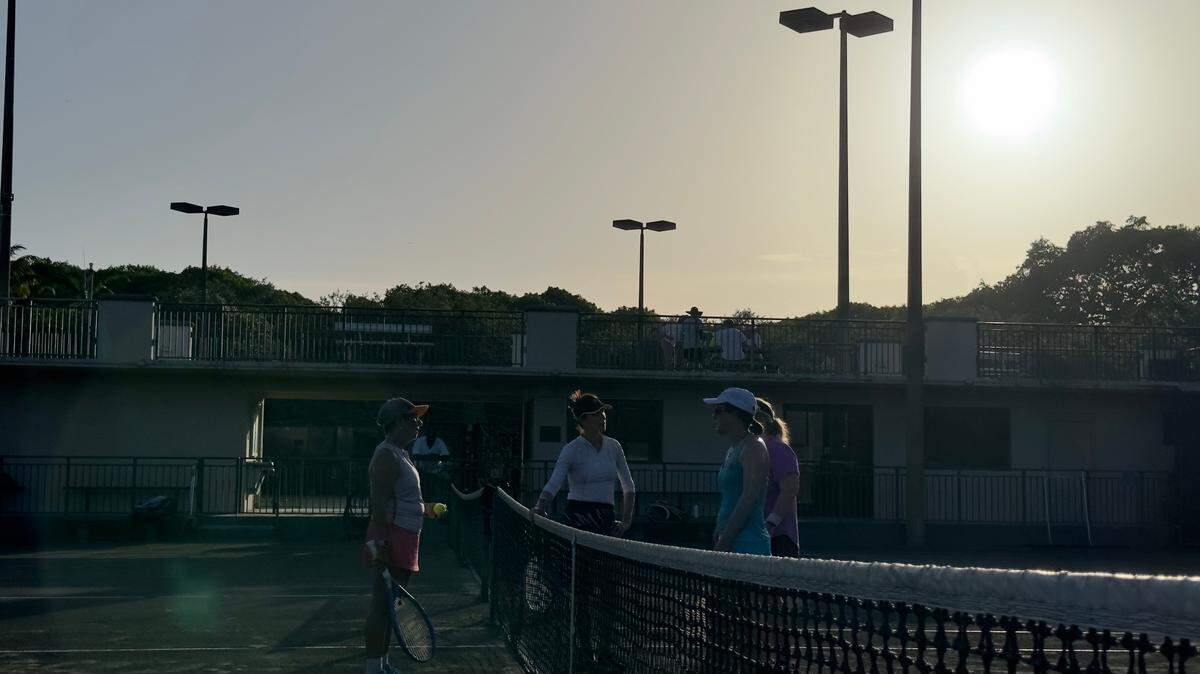 Even at 7:10 p.m. Tuesday, July 11, 2023, as the sun set on the courts at Coral Gables’ Salvadore Park Tennis Center, the thermometer still read 90 degrees. Tuesday set a high temperature record of 96 in Miami earlier in the afternoon, according to the National Weather Service in Miami.