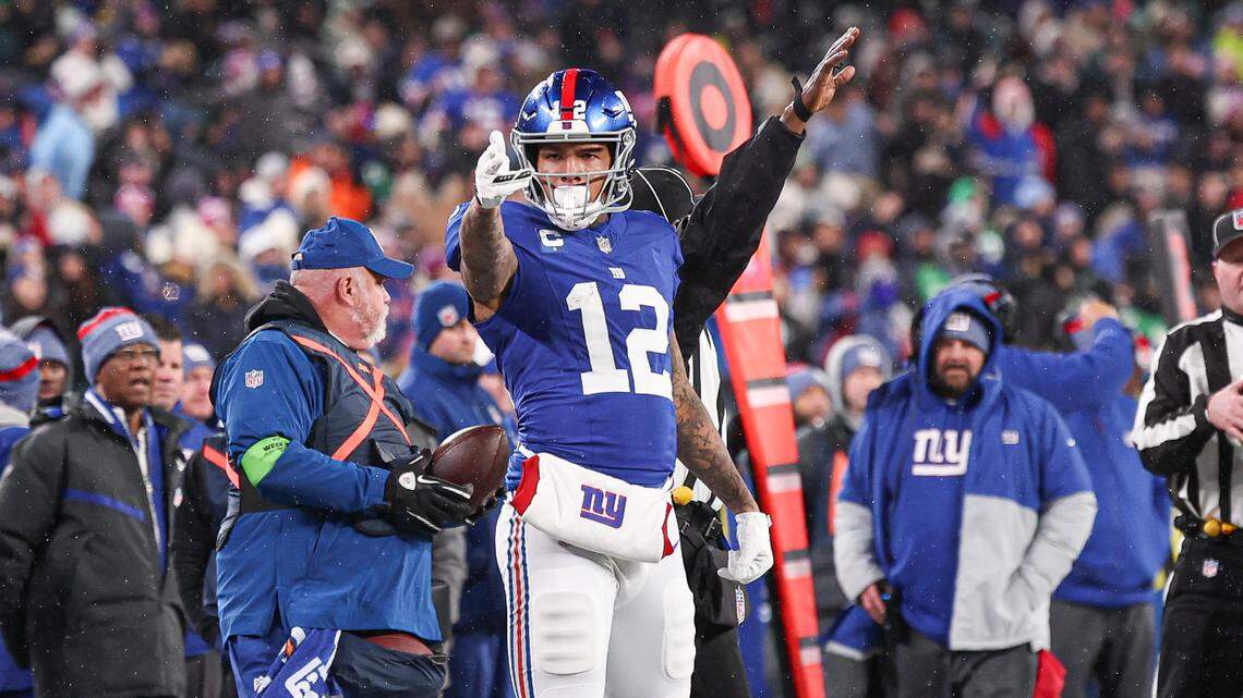 Jan 7, 2024; East Rutherford, New Jersey, USA; New York Giants tight end Darren Waller (12) reacts after a first down during the first half against the Philadelphia Eagles at MetLife Stadium.