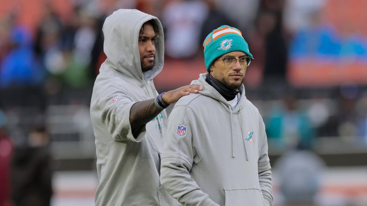 Miami Dolphins quarterback Tua Tagovailoa chats with head coach Mike McDaniel before kickoff against the Cleveland Browns on Sunday, Dec. 29, 2024, at Huntington Bank Field in Cleveland, Ohio..