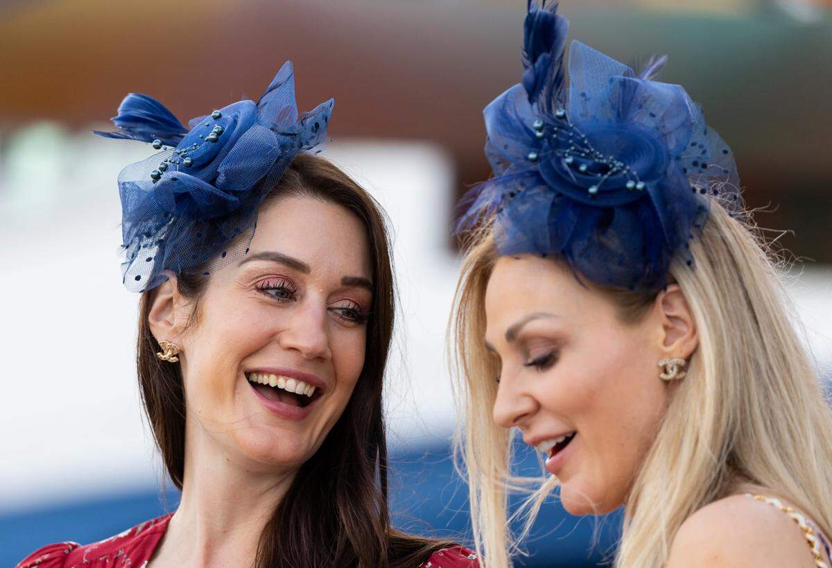 Heather Albertson, left, and her friend, Ashley Metzger, wait for the start of a race during the 2024 Pegasus World Cup Day at Gulfstream Park on Saturday, Jan. 27, 2024, in Hallandale Beach, Fla.