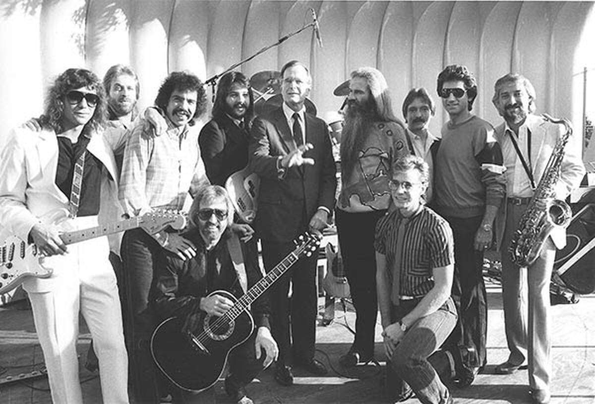 The Oak Ridge Boys and band with President George H.W. Bush at the White House during a Congressional barbecue picnic.