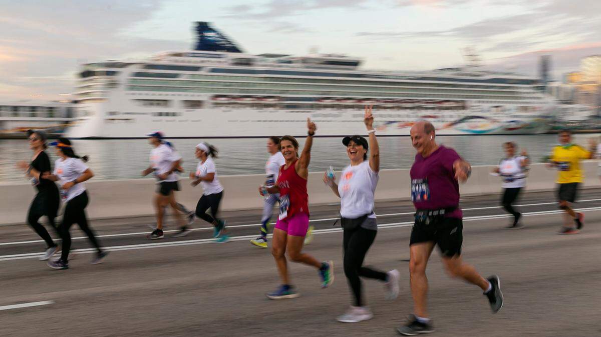 Runners make their way down the MacArthur Causeway as they participate in the 20th Annual Life Time Miami Marathon and Half Marathon on Sunday, Feb. 6, 2022. There were more than 15,000 combined runners registered for the marathon and half marathon.