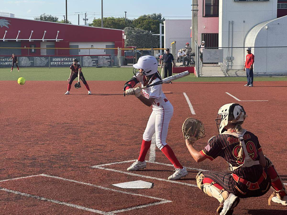 Doral Academy’s Zoey Abdullah prepares to take a swing during Thursday's Region 4-6A softball quarterfinal against South Broward at Doral Academy.