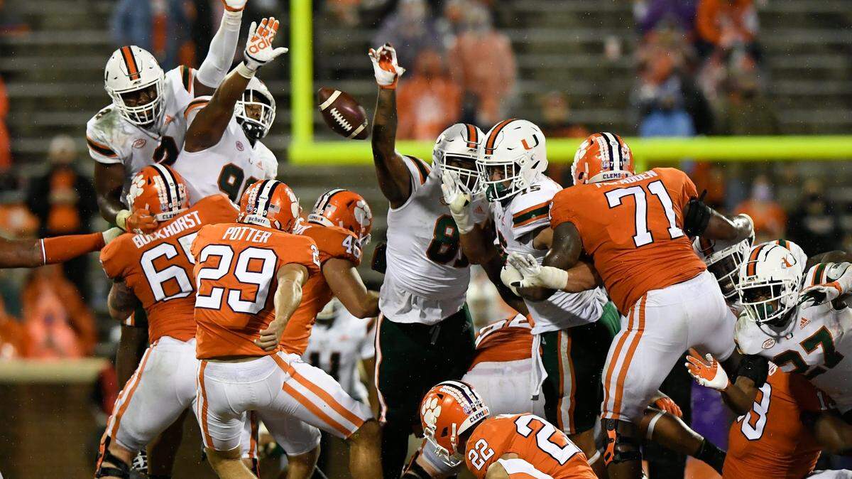 Miami blocks a 61 yard field goal attempt by Clemson place kicker B.T. Potter (29) during the 2nd quarter during ClemsonÕs game against the University of Miami at Clemson’s Memorial Stadium Saturday, October 10, 2020. ACC Pool/Bart Boatwright/The Clemson Insider