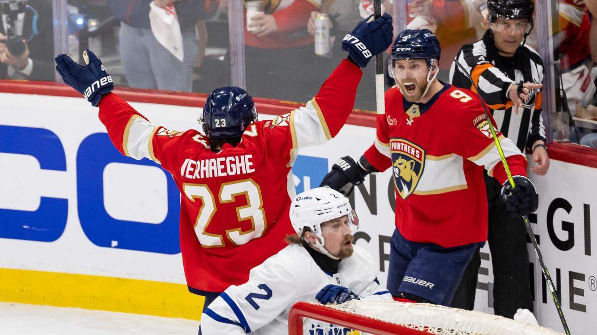 Florida Panthers center Carter Verhaeghe (23) celebrates with center Sam Bennett (9) after scoring against the Toronto Maple Leafs in the second period of Game 3 of a second-round Stanley Cup playoffs series at the Amerant Bank Arena on Friday, May 9, 2025, in Sunrise, Fla.