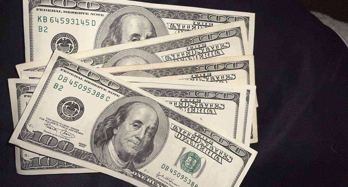 Police seized nearly $100,000 in cash from Kamlet’s Miami Beach condo.