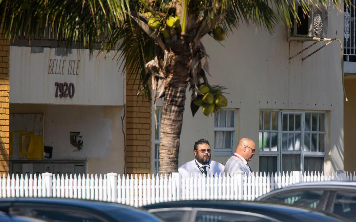 Police officers work a crime scene near 7920 East Dr. on Monday, Nov. 28, 2022, in North Bay Village, Fla. A man was killed, a woman was wounded and another man is in custody following a domestic-related shooting, authorities said.