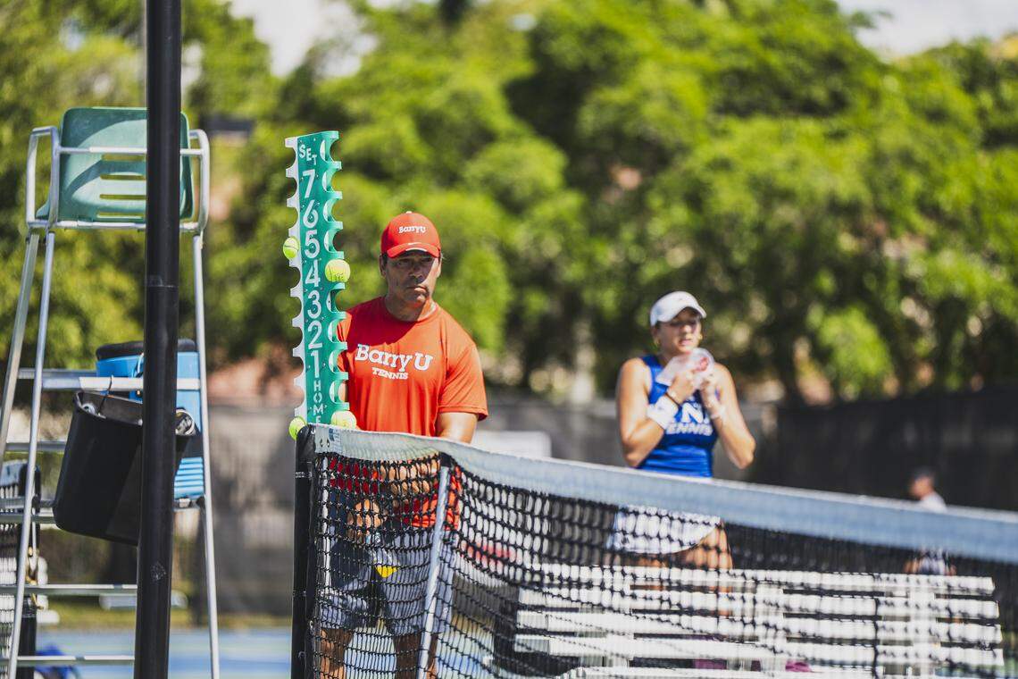 Barry University women's tennis coach Avi Kigel, who has led the Bucs to nine national championships, watches during practice.