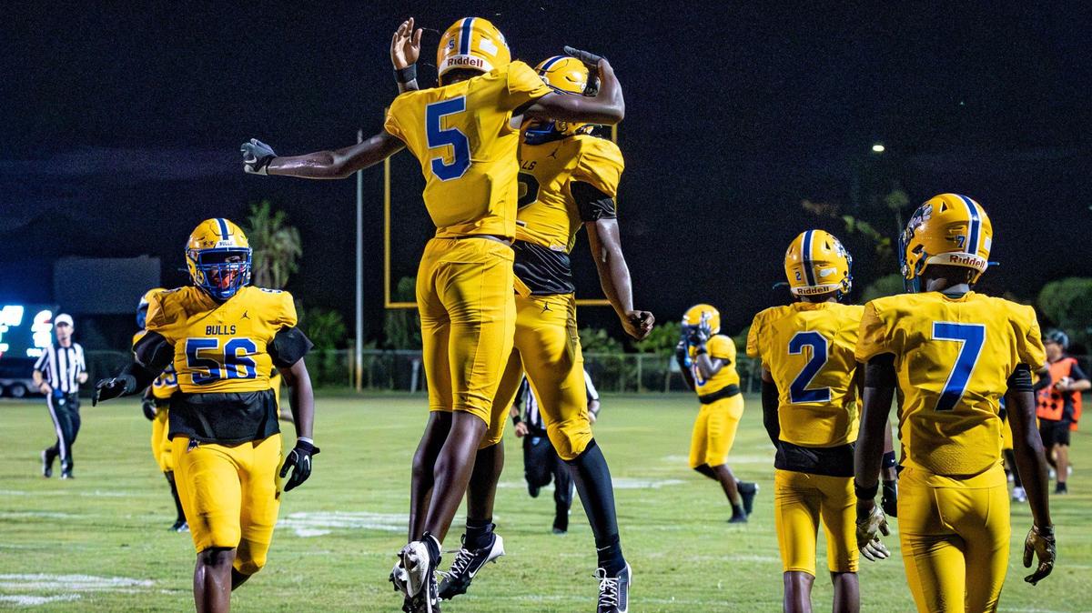 Miami Northwestern Bulls Calvin Russell Jr. (5) celebrates a touchdown in the first half of their football game against the Coconut Creek Cougars at Coconut Creek High School on Thursday, Aug. 22, 2024, in Coconut Creek, Fla.