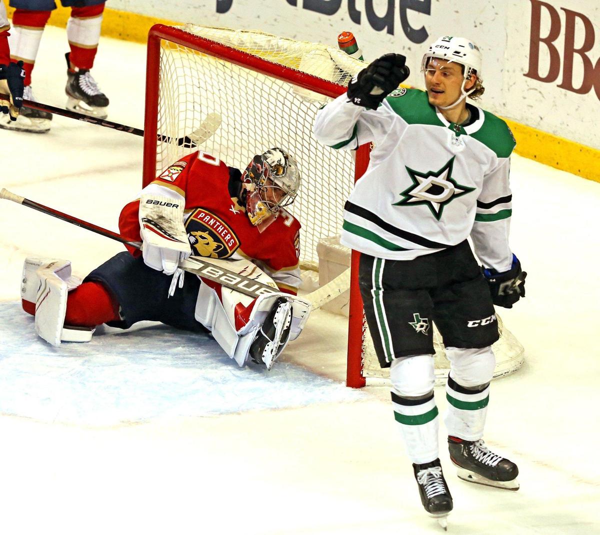 Dallas Stars Roope Hintz (24) celebrates after scoring in the first period as Florida Panthers goalie Spencer Knight (30) lays in the net at the BB&T Center in Sunrise, Florida, Monday, May 3, 2021.
