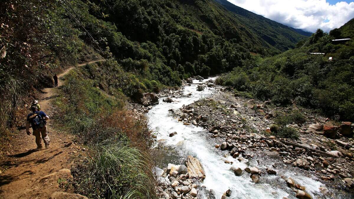 The trek follows the Santa Teresa river in the cloud forest through Coffee, Banana and Passion Fruit plantations, Collpapampa, Peru, June 29, 2007.